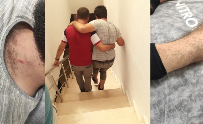 Polis kapısını yanlışlıkla çalan bilişimciyi darp etti