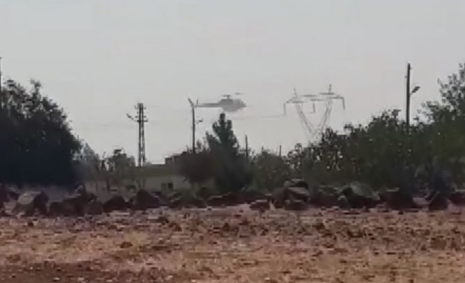 Yüksek gerilim hattında temizlik yapan helikopter paniğe neden oldu