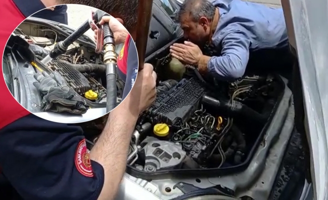 Motora sıkışan kedinin imdadına itfaiye yetişti!